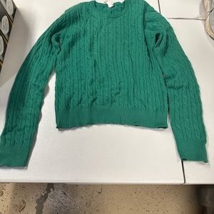 Green cableknit sweater